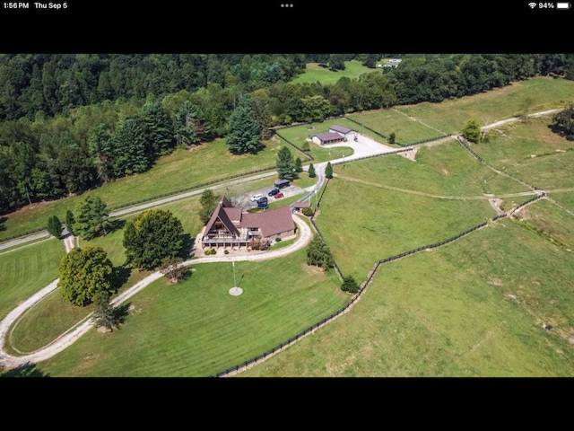 birds eye view of property featuring a rural view