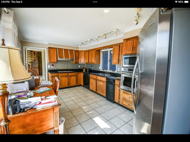 kitchen featuring sink, backsplash, black appliances, light tile patterned floors, and crown molding