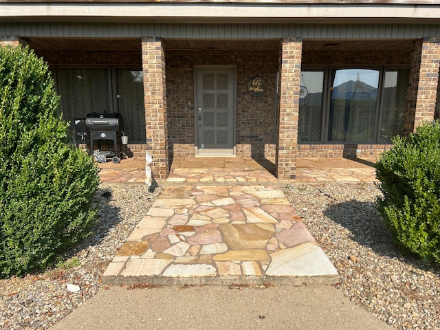 view of patio with a grill