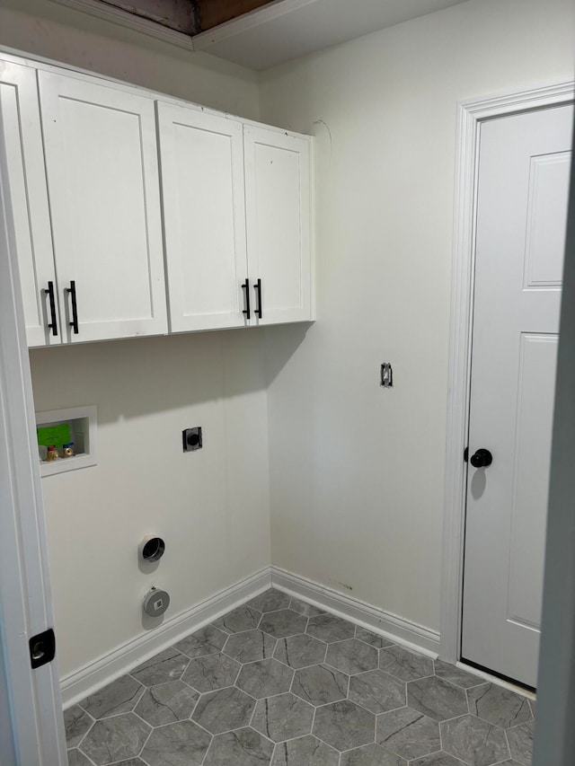 laundry area with cabinets, hookup for an electric dryer, and washer hookup