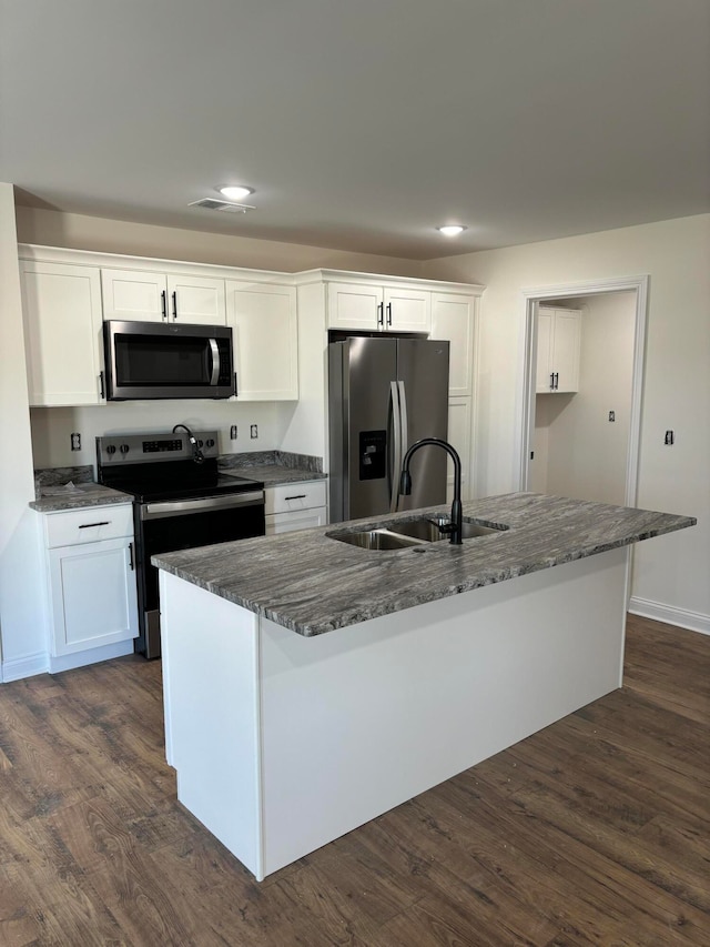 kitchen with sink, stainless steel appliances, dark hardwood / wood-style flooring, and white cabinets