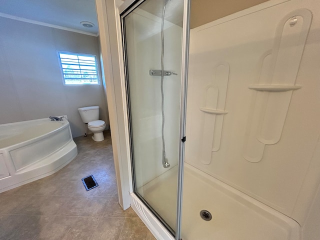 bathroom featuring tile patterned floors, crown molding, plus walk in shower, and toilet