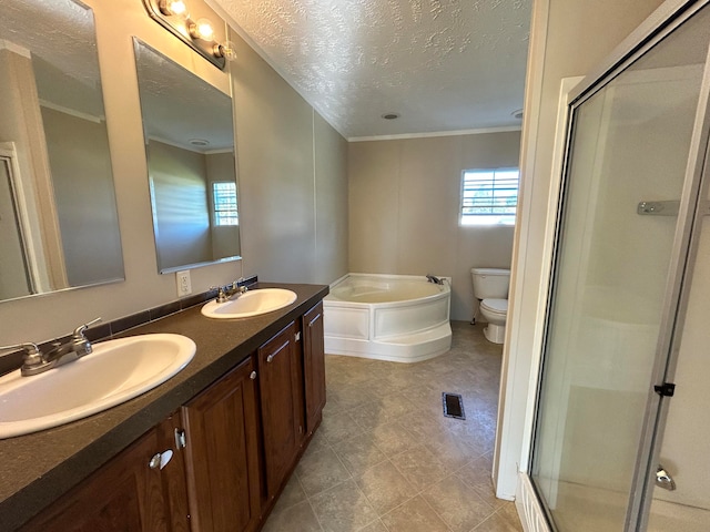 full bathroom with a textured ceiling, independent shower and bath, toilet, ornamental molding, and vanity