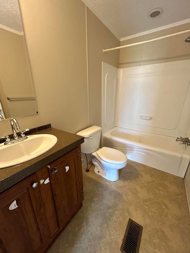 full bathroom with bathtub / shower combination, a textured ceiling, toilet, vanity, and tile patterned flooring