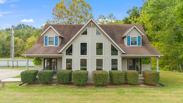 view of front of property featuring a front lawn and a porch