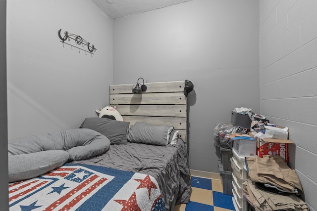 bedroom featuring a textured ceiling