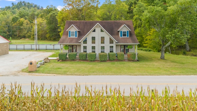 view of front of home featuring a front lawn and a porch