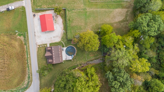 birds eye view of property featuring a rural view