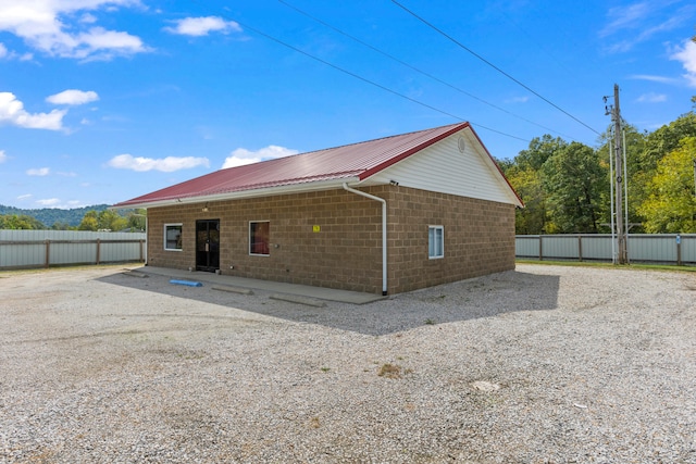 back of property featuring a patio area