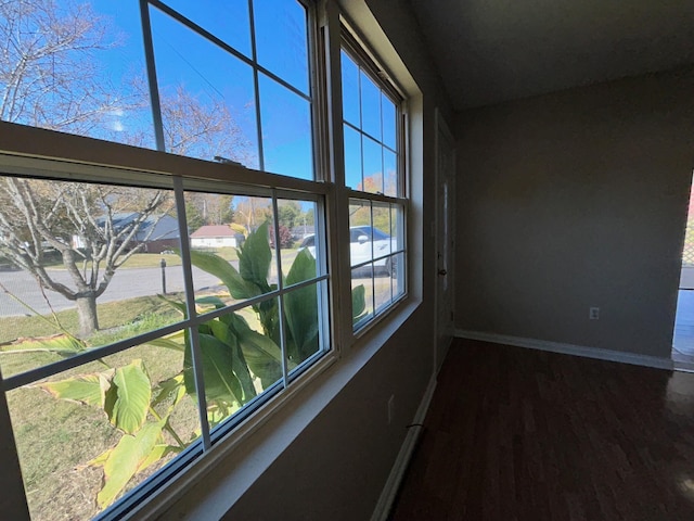 unfurnished sunroom with a wealth of natural light