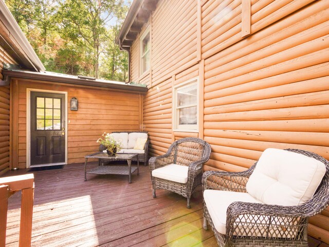 deck with an outdoor hangout area