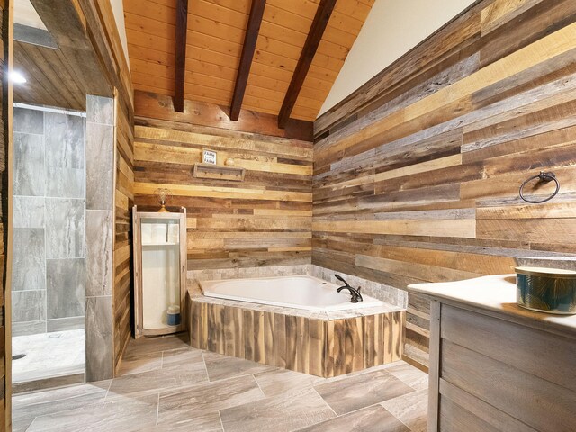 bathroom with lofted ceiling with beams, shower with separate bathtub, vanity, and wood ceiling