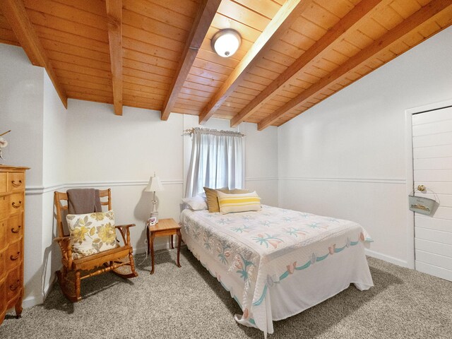 carpeted bedroom featuring wooden ceiling and lofted ceiling with beams