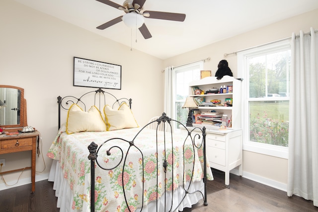 bedroom with hardwood / wood-style flooring and ceiling fan