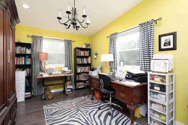 office space featuring a chandelier, dark hardwood / wood-style flooring, and a wealth of natural light