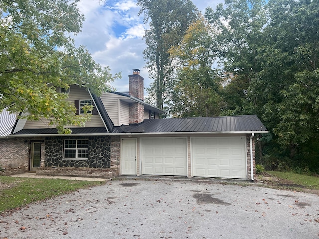 view of front of house with a garage