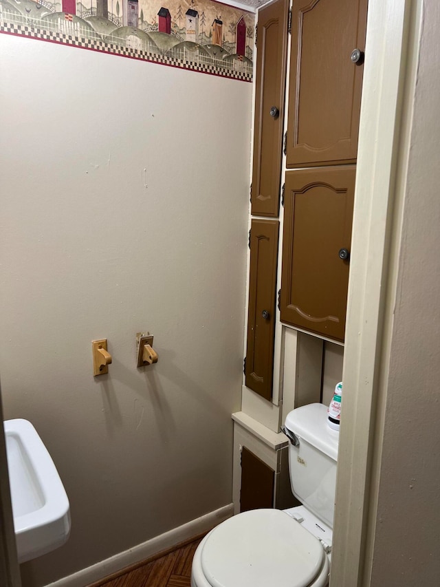 bathroom featuring toilet