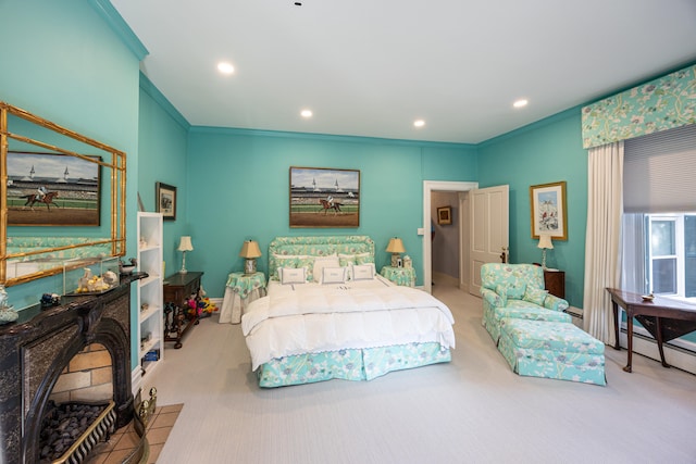 bedroom with ornamental molding and light carpet