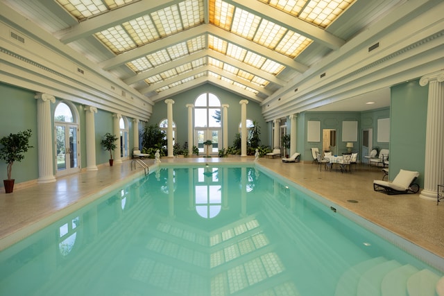 view of pool featuring a skylight