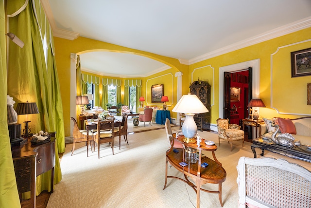 living room featuring a baseboard radiator, light carpet, and crown molding