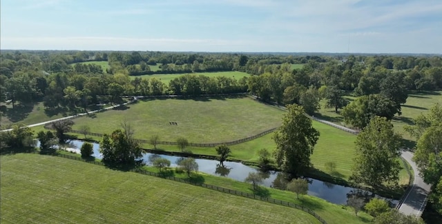 aerial view with a water view and a rural view