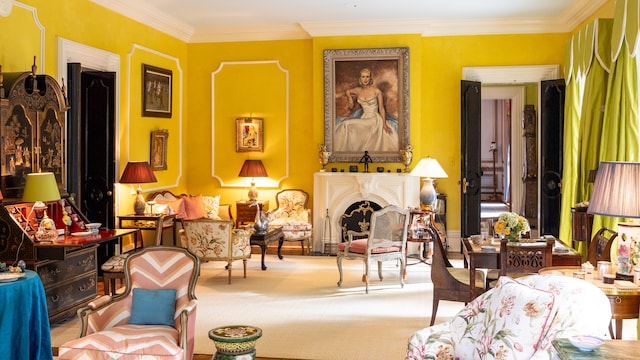 interior space with carpet floors and crown molding