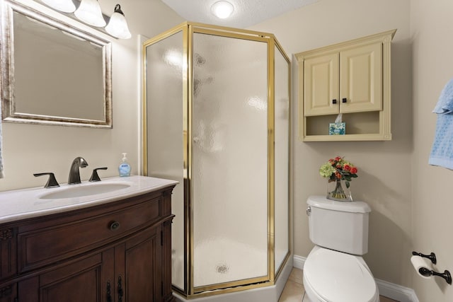 bathroom with tile patterned flooring, a textured ceiling, an enclosed shower, vanity, and toilet