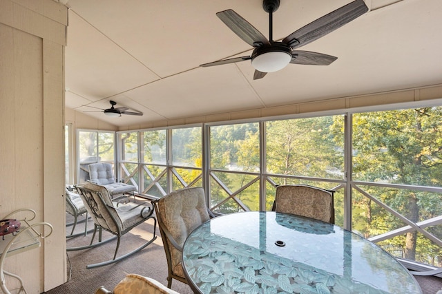 sunroom / solarium with ceiling fan