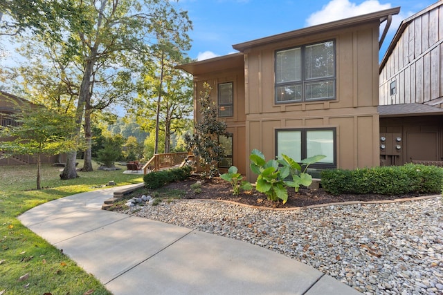 exterior space with a front lawn