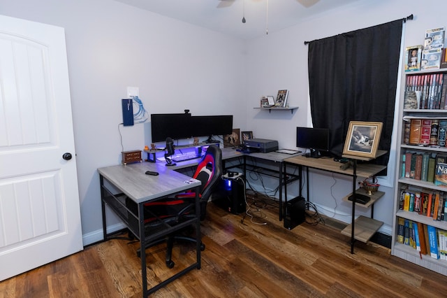 office space featuring dark wood-type flooring and ceiling fan