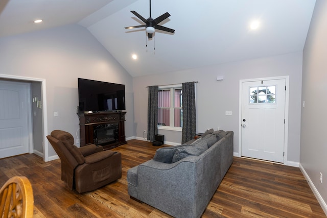 living room featuring high vaulted ceiling, dark wood-type flooring, and ceiling fan