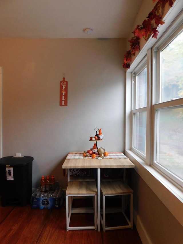 dining room with dark hardwood / wood-style floors