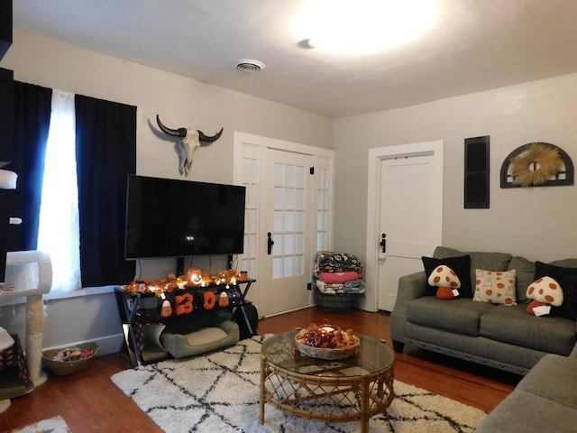 living room with dark wood-type flooring