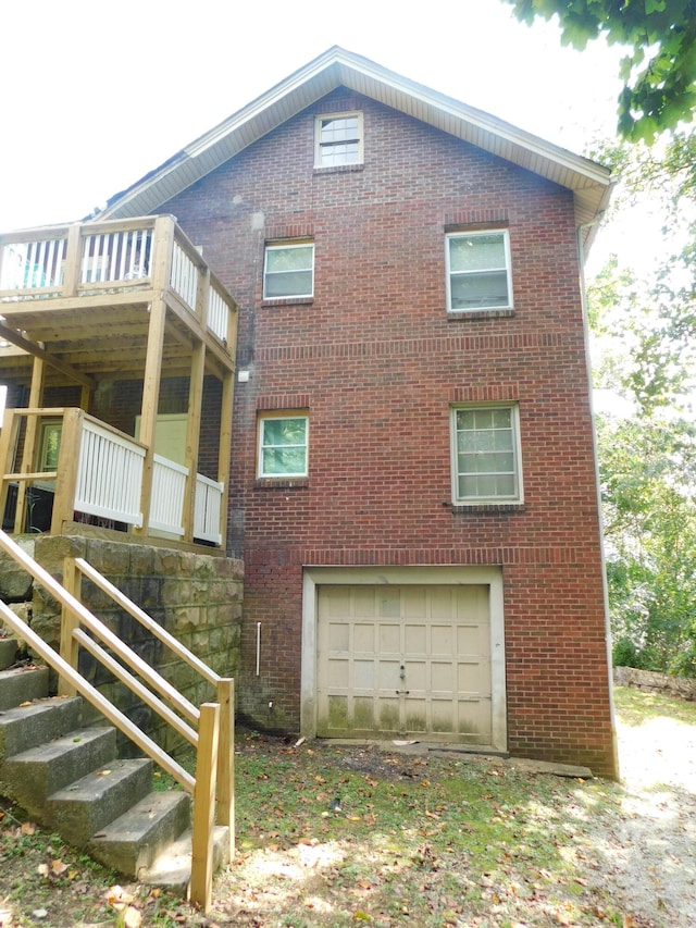 view of side of property featuring a garage