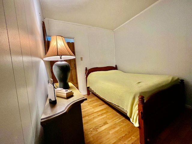 bedroom with wood-type flooring