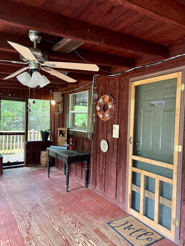 interior space featuring ceiling fan