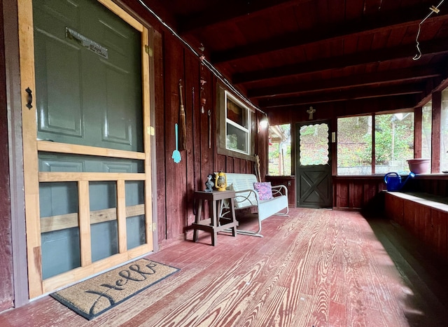 sunroom / solarium with beam ceiling