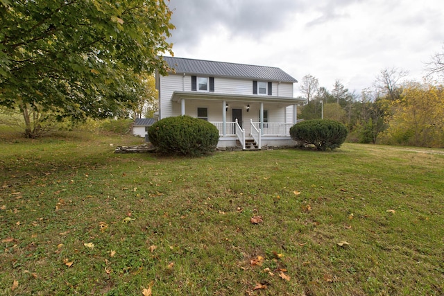 view of front of home with a front lawn and a porch