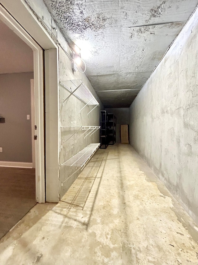 hallway featuring concrete floors