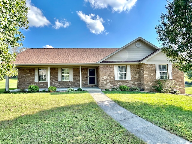 single story home with a front lawn