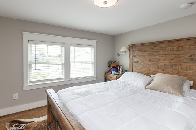 bedroom featuring hardwood / wood-style flooring