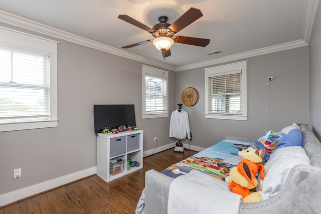 bedroom featuring ornamental molding, dark wood-type flooring, and ceiling fan