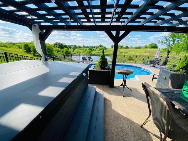 view of pool featuring a pergola, a water view, and a patio area