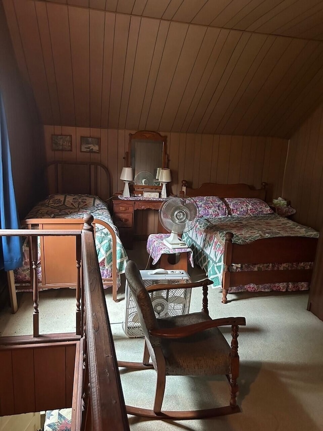 bedroom featuring wood ceiling, lofted ceiling, and wood walls