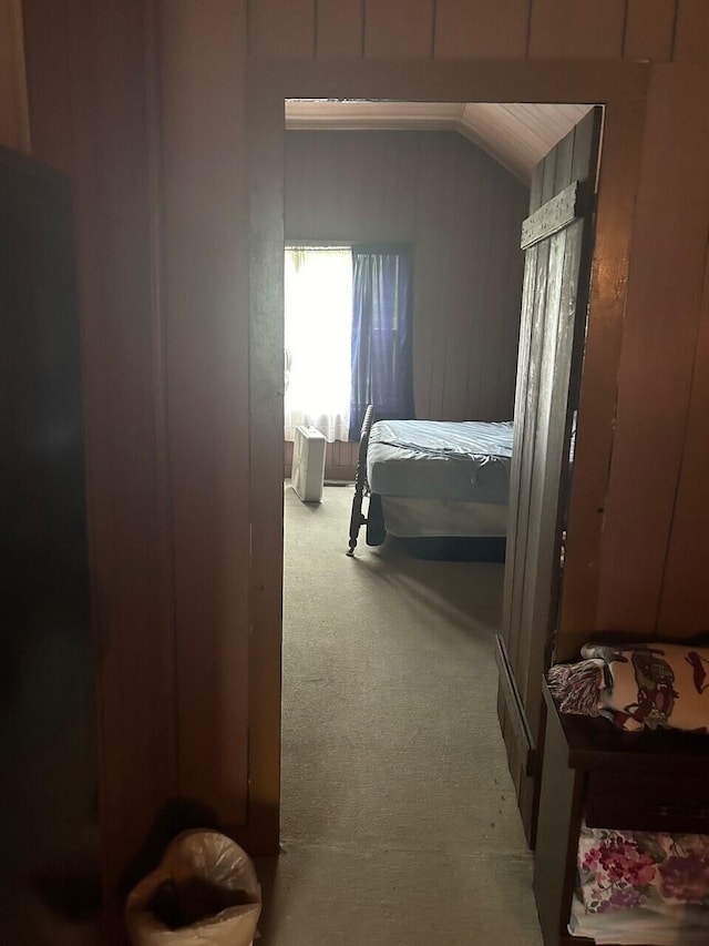 bedroom featuring carpet floors and lofted ceiling