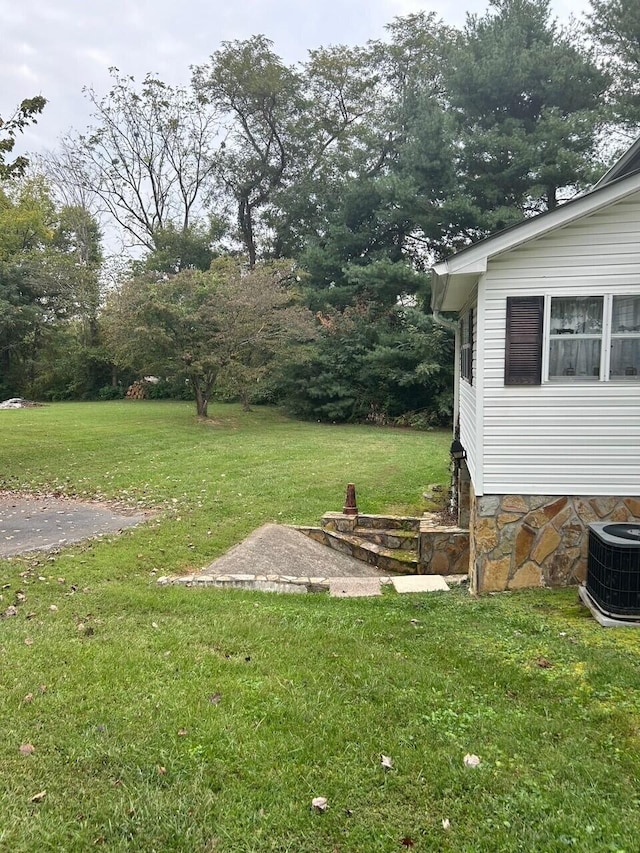 view of yard with cooling unit