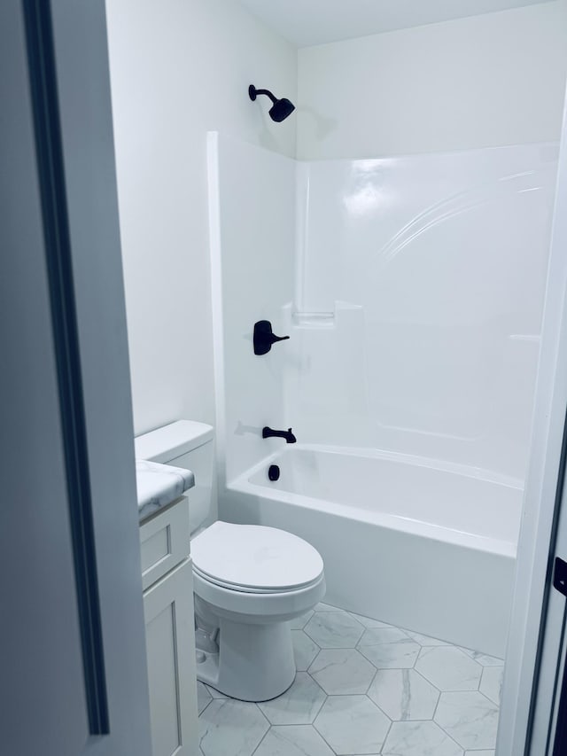 full bathroom featuring shower / bathtub combination, toilet, and vanity