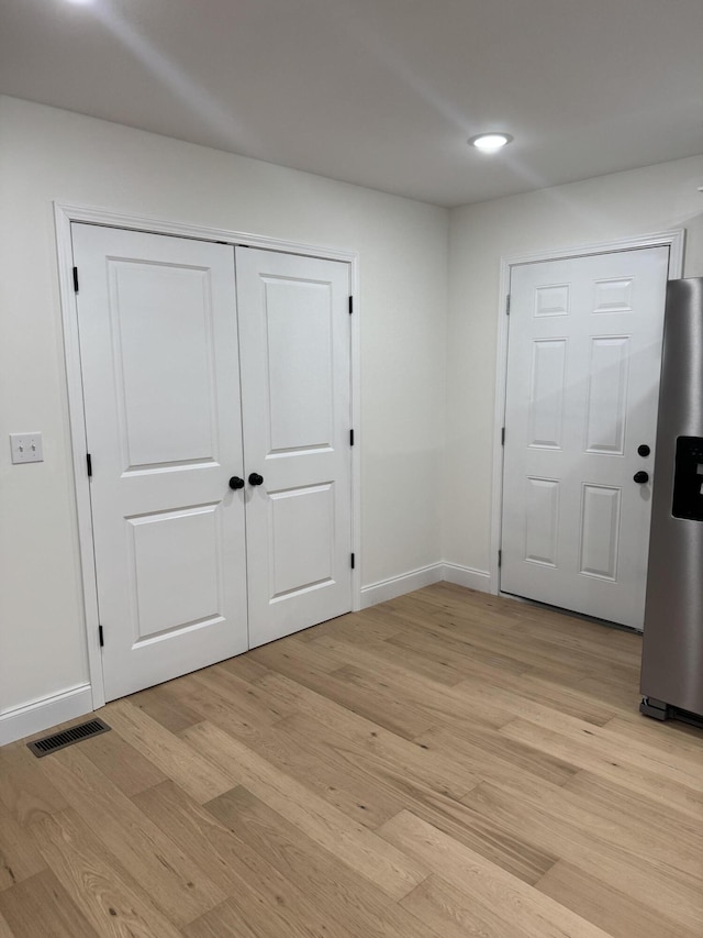 interior space with light hardwood / wood-style floors