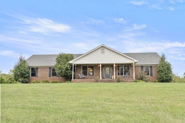 ranch-style home with a front lawn