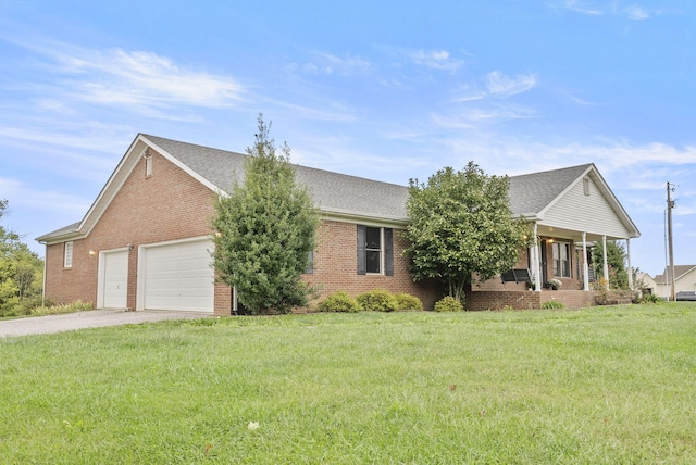 ranch-style home featuring a garage and a front lawn